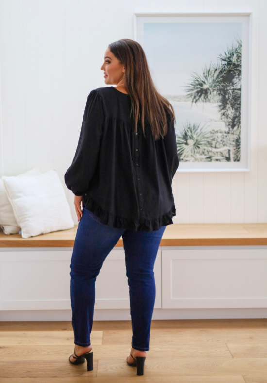 Ladies Long Sleeve Button Back Top - Long Sleeve with Elasticised Cuff - Curved hemline front and back - Sizes S - XXL Available - back full length view paired with Carter curve dark denim jeans - Daisy's Closet Mila Long Sleeve Top Black