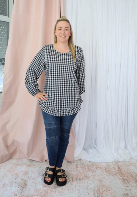 Black gingham long sleeve top for women from Daisy's Closet, featuring a classic pattern and comfortable fit.