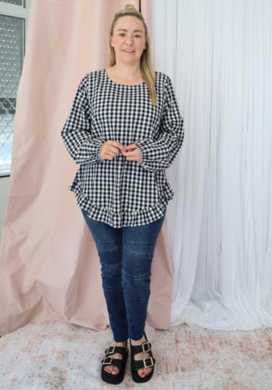 Black gingham Molly long sleeve top by Daisy's Closet, featuring a classic button-up design and fitted silhouette.