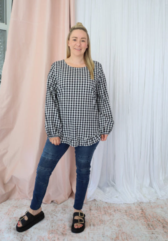 Black gingham Molly long sleeve top from Daisy's Closet, stylish and comfortable for casual wear.