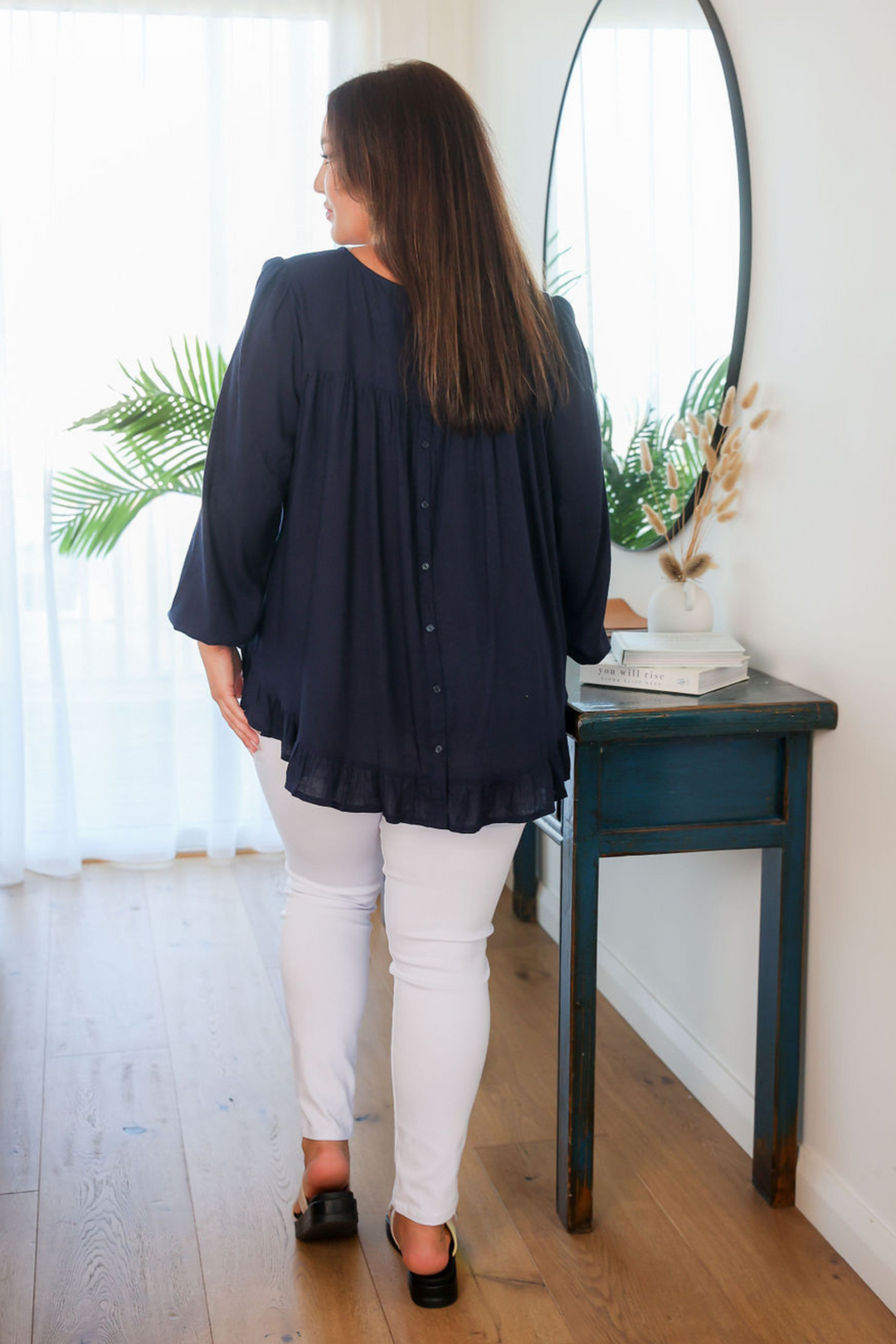 Ladies Long Sleeve Button Back Top - Round Neckline - Flowing Style - Navy - Sizes S/M - Xl/XXL - Mila Button Back Top Back Full Length View Size L/XL Paired with Delta White Jeans Daisy's Closet
