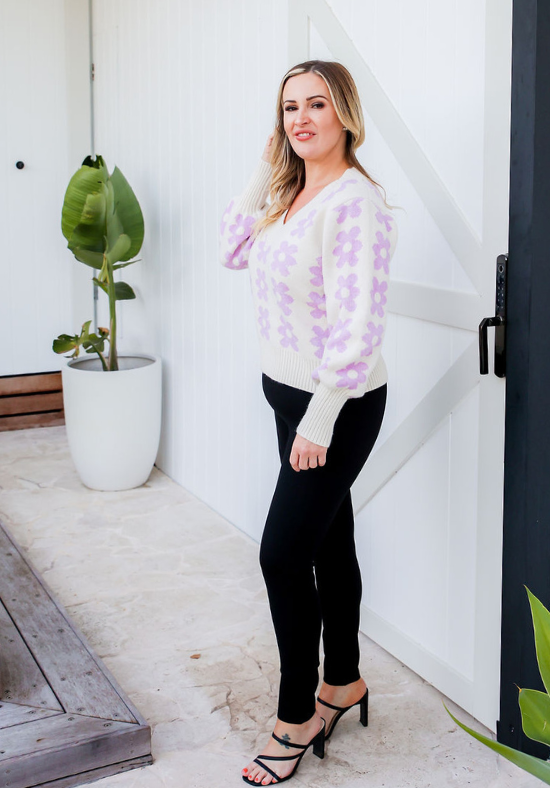 Ldies V Neck Jumper - Knit Jumper - White with Daisy Print Lilac - Long Sleeve - Sizes S/M - L/XL - Daisy Knit Full Length Side View Paired With Aria Black Pants - Daisy's Closet