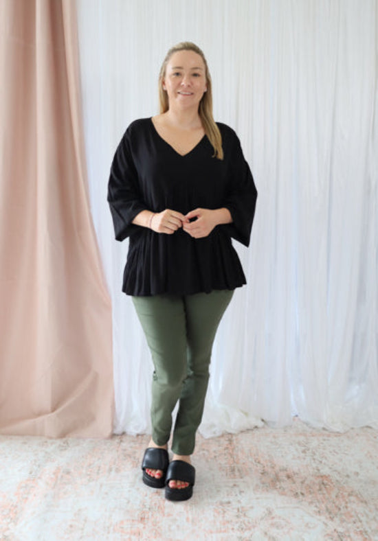 Black long sleeve top from Daisy's Closet, featuring a stylish fit and soft fabric, perfect for casual or layered looks.
