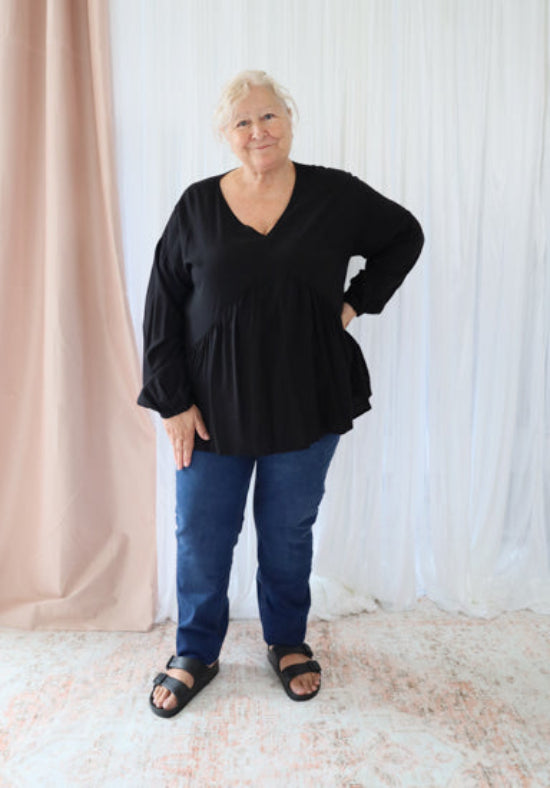 Black long sleeve Remi top from Daisy's Closet, featuring a stylish and comfortable design perfect for casual wear.
