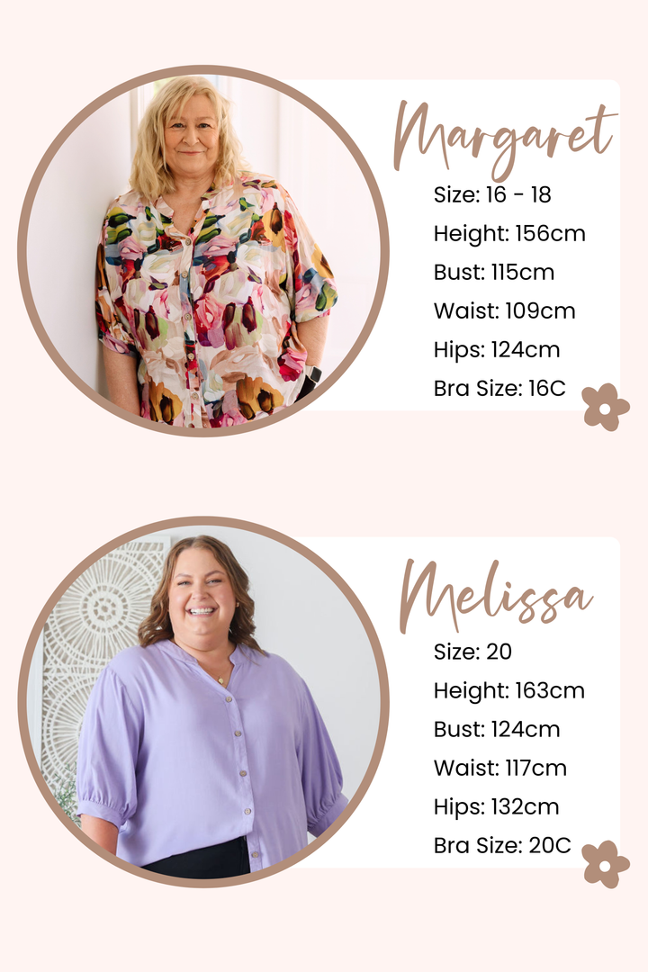 Black long sleeve Daisybell print top by Daisy's Closet, featuring a floral pattern and comfortable fit.