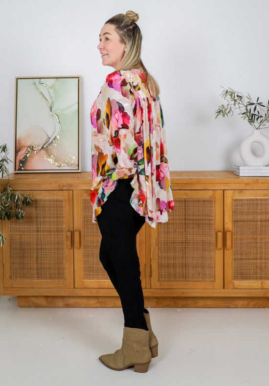 Daisy's Closet Mila long sleeve top with paintbrush print, soft fabric, and relaxed fit, perfect for casual wear.