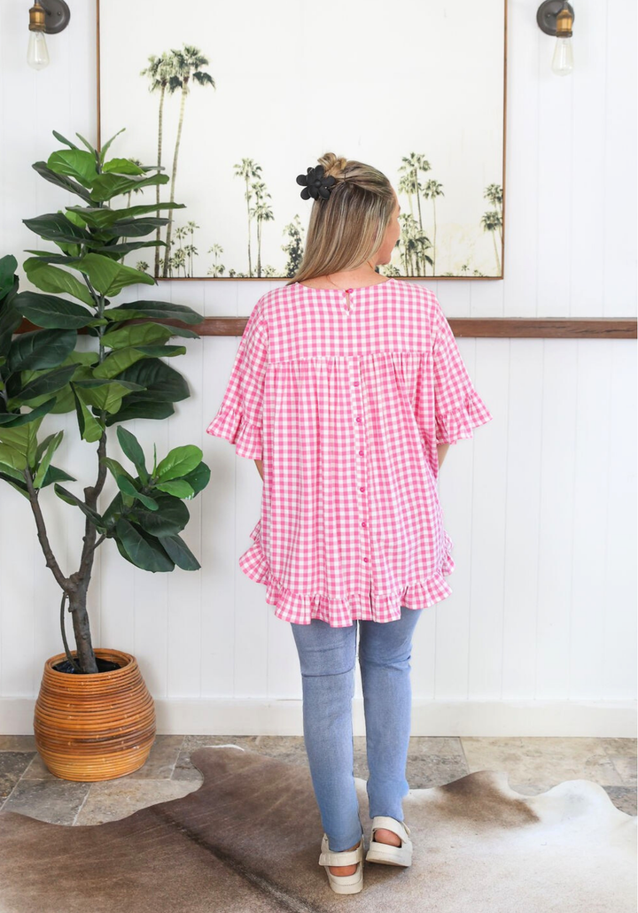 Pink gingham Molly top by Daisy's Closet featuring short sleeves and a classic collar, perfect for casual summer wear.