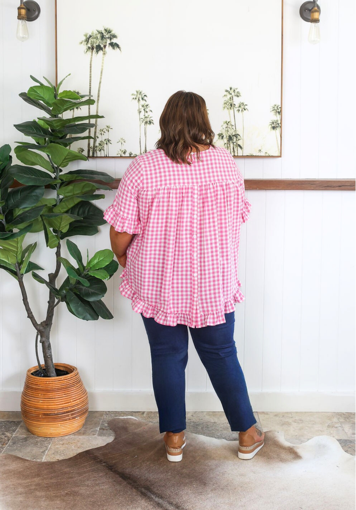Pink gingham Molly top for women, short-sleeve blouse from Daisy's Closet with a classic gingham pattern.