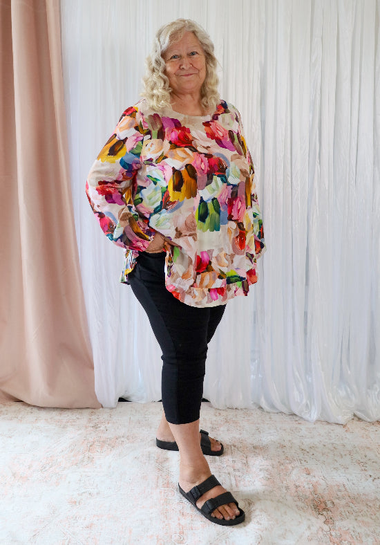 Long sleeve paintbrush print top by Daisy's Closet, featuring button back detail and casual shirt style for women.