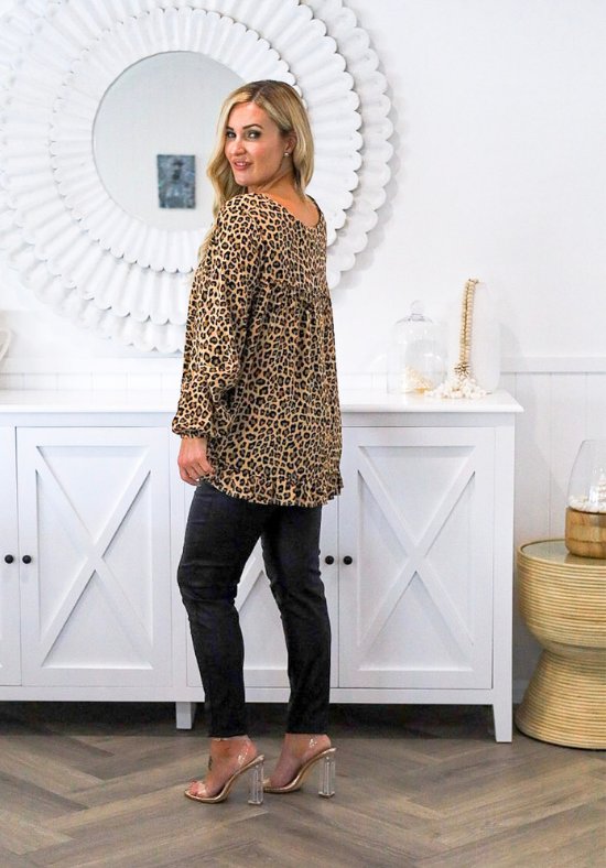 Ladies Long Sleeve Leopard Top - Button Back Top - Long Sleeve with elasticised cuff - curved hemline front and back - back left hand side standing view of size S/M- Daisy's Closet