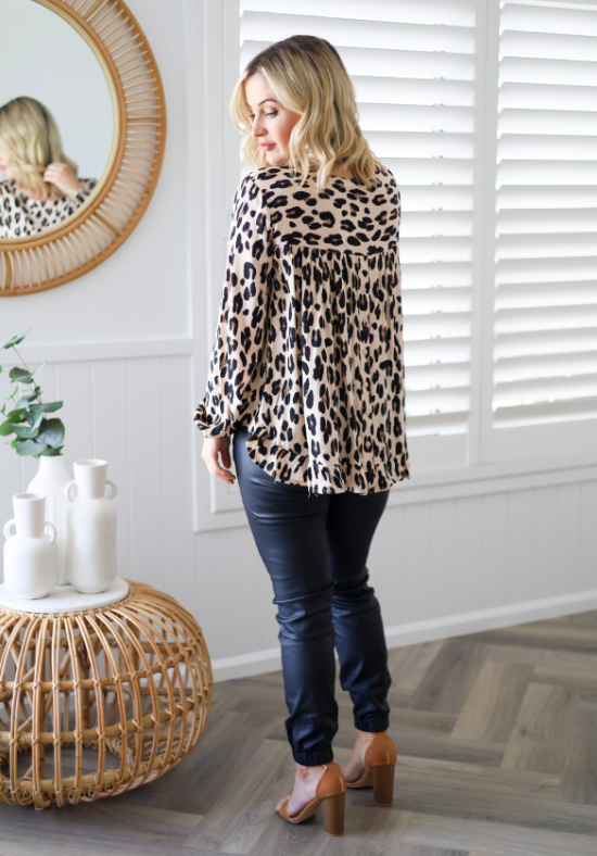 Daisy's Closet Mila long sleeve light leopard top, stylish shirt with a leopard print pattern and fitted design.